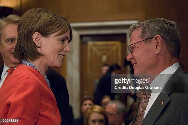 Administrator Stephen Johnson is greeted by James Inhofe, R-OK., before the start of the full committee hearing on the implications of the Supreme...