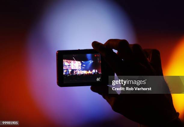 Fan in the audience records a Lady Gaga concert on a video camera phone at Gelredome on May 15, 2010 in Arnhem, Netherlands.