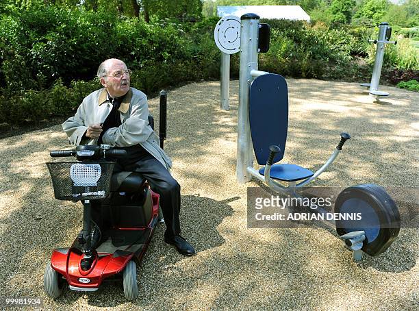 British pensioner Ronald Woolf, 84 inspects the new exercise machines following the official opening of the first pensioners' playground in Hyde Park...