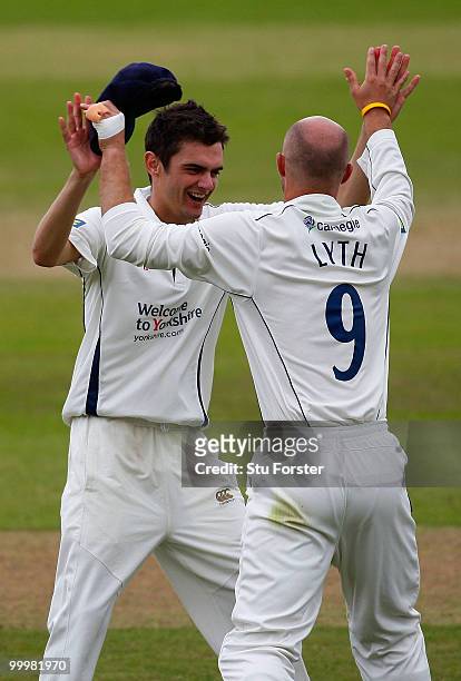 Yorkshire bowler David Wainwright celebrates with Adam Lyth after they had combined to dismiss Somerset batsman Jos Buttler during day three of the...