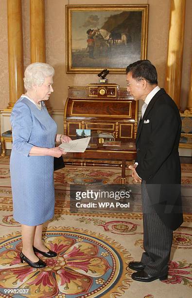 Queen Elizabeth II receives the Ambassador of the Republic of Korea Choo Kyu Ho as he presents his Credentials at Buckingham Palace on May 19, 2010...