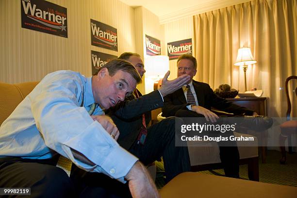 Mark Warner watches results come in with Gov. Timothy Kaine, D-VA., and Jim Webb, D-VA., in Warner's room at the Hilton McLean Tysons Corner in...