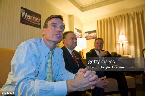 Mark Warner watches results come in with Gov. Timothy Kaine, D-VA., and Jim Webb, D-VA., in Warner's room at the Hilton McLean Tysons Corner in...