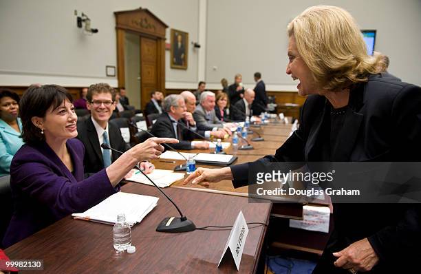 Nessa Feddis, vice president and senior counsel for the American Bankers Association's Center for Regulatory Compliance greets Carolyn Maloney, D-NY,...