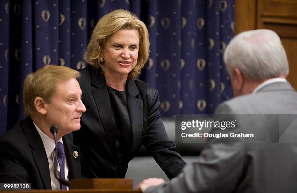 Spencer Bachus, R-AL., Carolyn Maloney, D-NY, and Dennis Dollar of Dollar Associates, LLC, talk before the start of the House Financial Services...