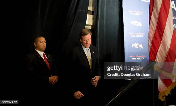 Mark Warner gets his first look at the overflow crowd to thank them for his victory in his bid for the U.S. Senate at the Hilton McLean Tysons Corner...