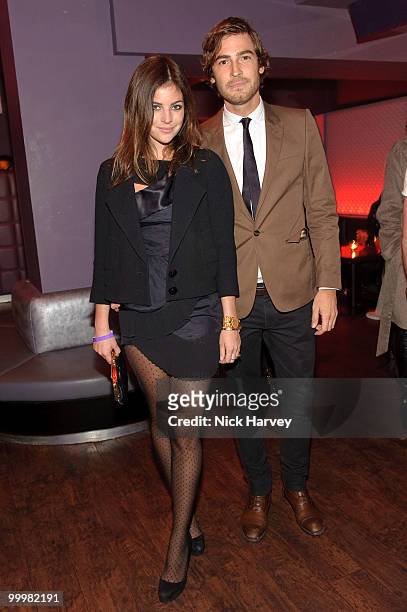 Julia Restoin Roitfeld and Robert Konjic attend launch party of Linda Farrow for Roisin Murphy hosted by Aura on February 21, 2010 in London, England.