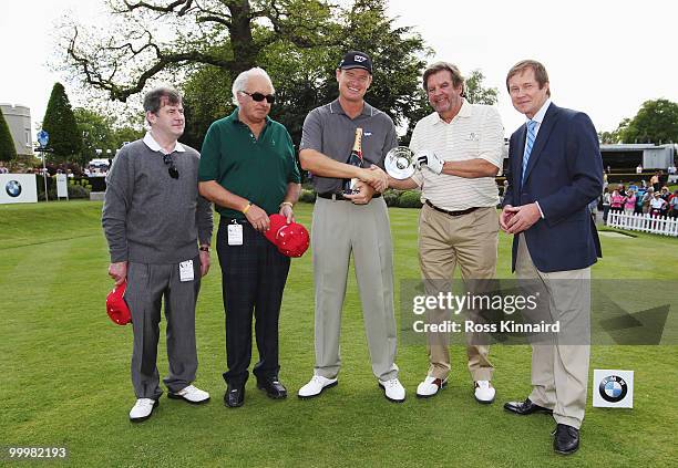 McManus, John Magnier, Ernie Els, Johann Rupert and European Tour Chief Executive George O'Grady pose for a photograph as Ernie Els receives a trophy...