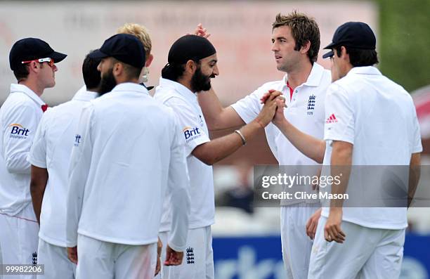 Liam Plunkett of England Lions celebrates the wicket of Tamim Iqbal of Bangladesh during day one of the match between England Lions and Bangladesh at...