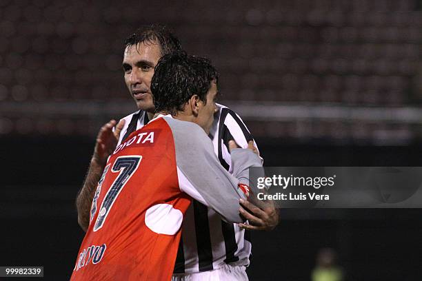 Omar Bravo of Chivas de Guadalajara greets with Pedro Sarabia of Libertad after the match as part of Libertadores Cup at Defensores del Chaco Stadium...