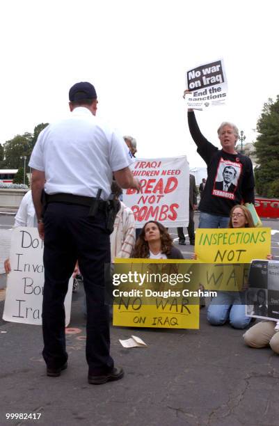 Anti-war protesters stage a sit-in, at the U.S. Capitol. They were later arrested by U.S. Capitol Police for civil disobedience