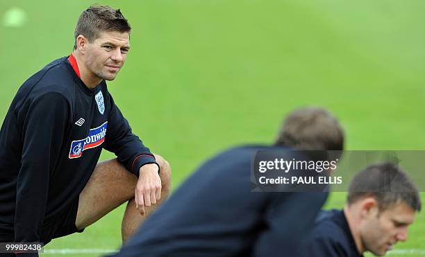 England footballer Steven Gerrard stretches during a team training session in Irdning, Austria on May 19, 2010 ahead of the World Cup Finals in South...