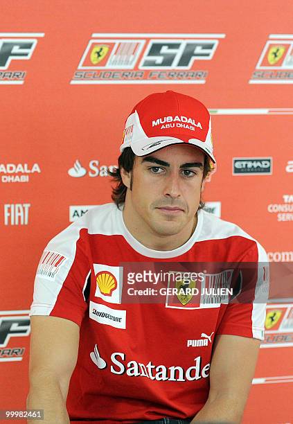 Ferrari's Spanish driver Fernando Alonso gives a press conference in his team motorhome at the Monaco street circuit on May 12 three days ahead of...