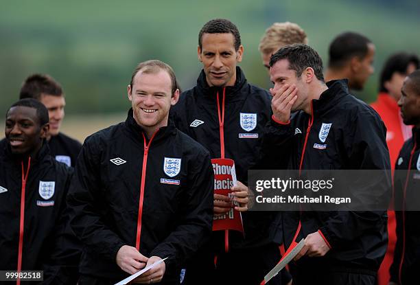 Wayne Rooney shares a joke with Rio Ferdinand and Jamie Carragher during an England training session on May 19, 2010 in Irdning, Austria.