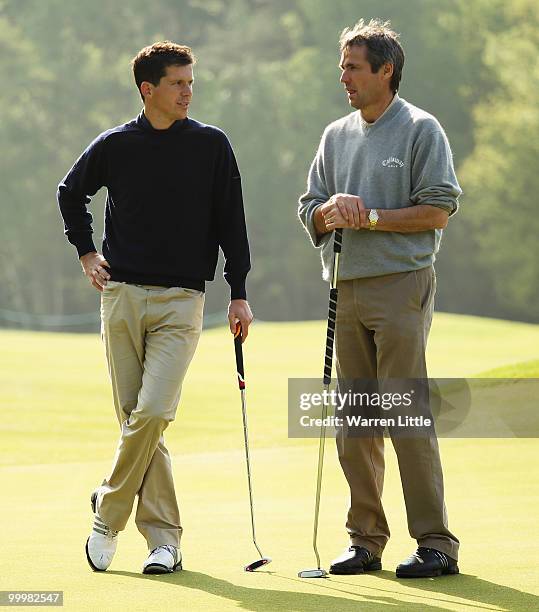 Commentator Alan Hansen talks with playing partner, former tennis player Tim Henman during the Pro-Am round prior to the BMW PGA Championship on the...