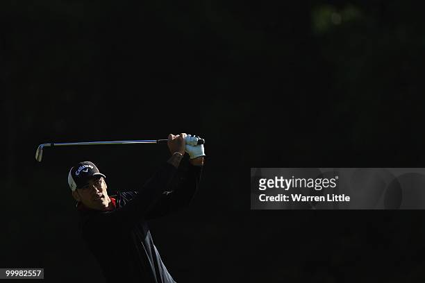 Alvaro Quiros of Spain plays an iron shot during the Pro-Am round prior to the BMW PGA Championship on the West Course at Wentworth on May 19, 2010...