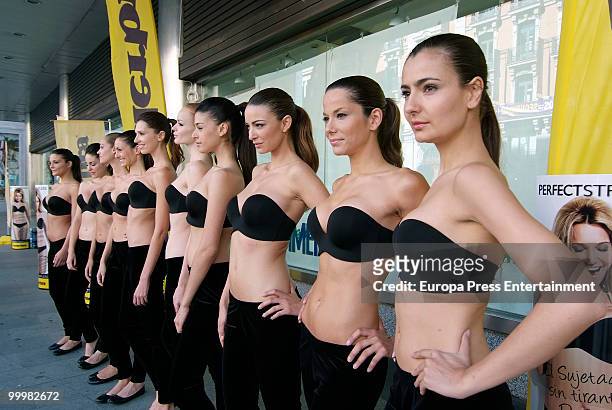 Several models wearing the bra 'Perfect Strapless, designed by Wonderbra, poses before jumping on a trampoline to test the effectiveness of the new...