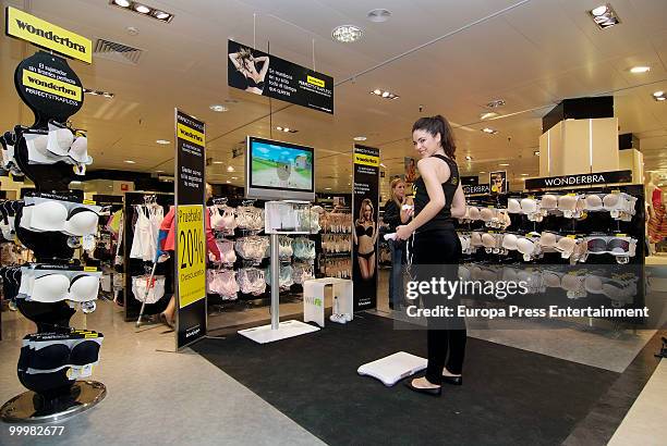 Model wearing the bra 'Perfect Strapless, designed by Wonderbra, before jumping on a trampoline to test the effectiveness of the new item of clothing...