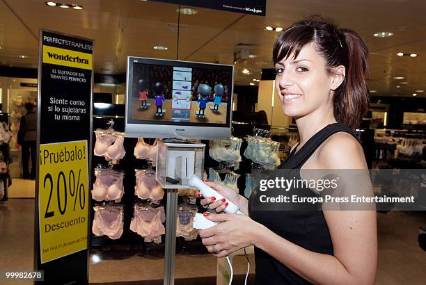 Model wearing the bra 'Perfect Strapless, designed by Wonderbra, before jumping on a trampoline to test the effectiveness of the new item of clothing...