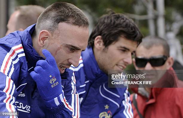 French football forward Franck Ribery and French midfielder Yoann Gourcuff leave their hotel on May 19, 2010 in Tignes, in the French Alps,for a...