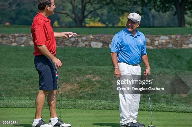 Joe Baca, D-CA, and Zack Wamp, R-TN., during a little good natured teasing at the First Tee Congressional Golf Tournament at TPC Potomac at Avenel...