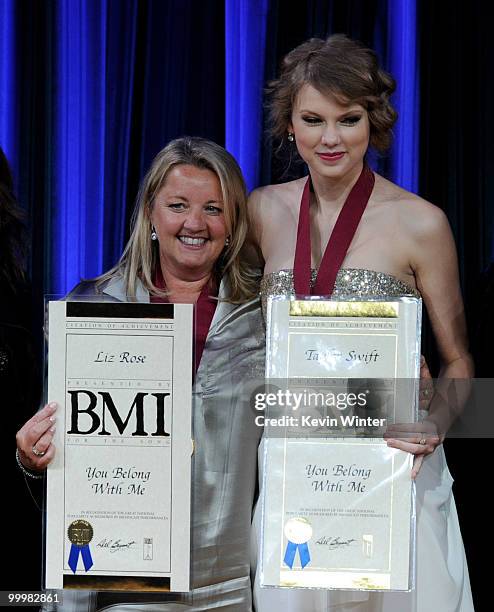 Songwriter Liz Rose and singer/songwriter Taylor Swift accept an award for Most Performed Pop Song for "You Belong to Me" at the 58th Annual BMI Pop...