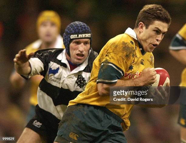 Scott Staniforth of Australia breaks away from Olivier Magne of the Barbarians during the Scottish Amicable Challenge match between the Barbarians...