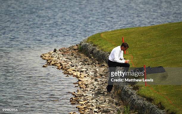 Mark Roberts of Queenwood picks his ball up, after it landed out of bounds on the 17th hole during the Glenmuir PGA Professional Championship...