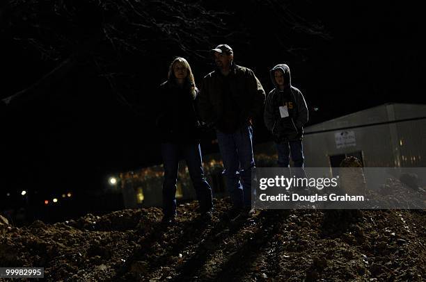 Karen Bennett, Greg Gilley and eight-year-old Beaux Gilley from Greenville, TN. Watches the State Funeral of President Gerald R. Ford. Gilley was...