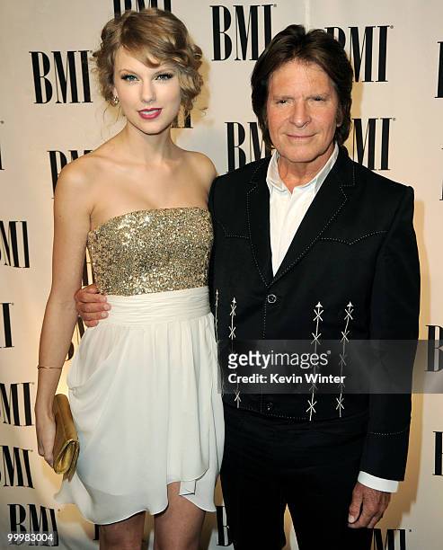 Singer/songwriters Taylor Swift and John Fogerty arrive at the 58th Annual BMI Pop Awards at the Beverly Wilshire Hotel on May 18, 2010 in Beverly...