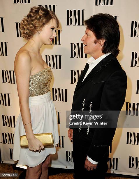 Singer/songwriters Taylor Swift and John Fogerty arrive at the 58th Annual BMI Pop Awards at the Beverly Wilshire Hotel on May 18, 2010 in Beverly...