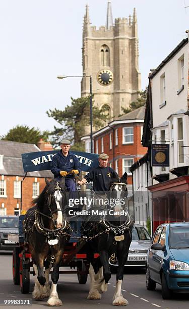 Head horseman Barry Petherick and horseman Martin Whittle deliver beer to local pubs using Shire Horses Max and Monty on May 19, 2010 in Devizes,...