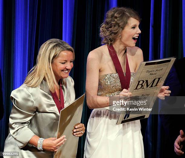 Songwriter Liz Rose and singer/songwriter Taylor Swift accept an award for Most Performed Pop Song for "You Belong to Me" at the 58th Annual BMI Pop...