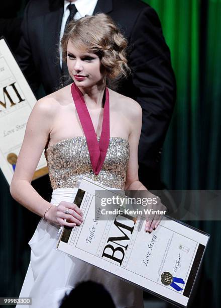 Singer/songwriter Taylor Swift accepts a Most Performed Pop Song award for "Love Story" at the 58th Annual BMI Pop Awards at the Beverly Wilshire...