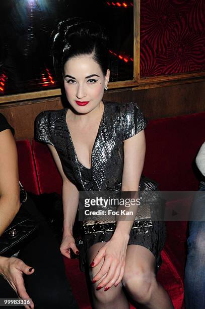 Dita Von Teese attends the Jean-Charles de Castelbajac - Paris Fashion Week After Party at The Baron Club on March 9, 2010 in Paris, France.