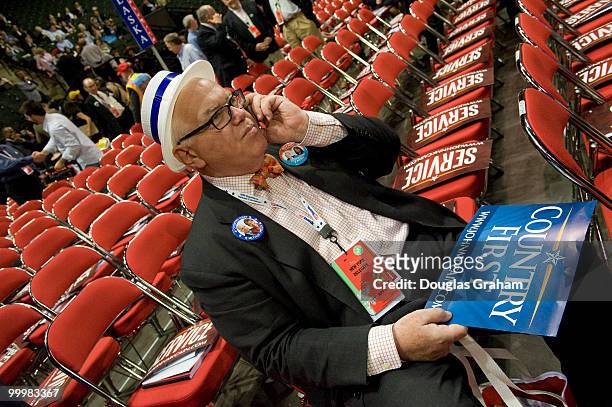 Wayne Baden talks on his cell phone on the floor of the Xcel Energy Center during the Republican National Convention in St. Paul. September 2, 2008.