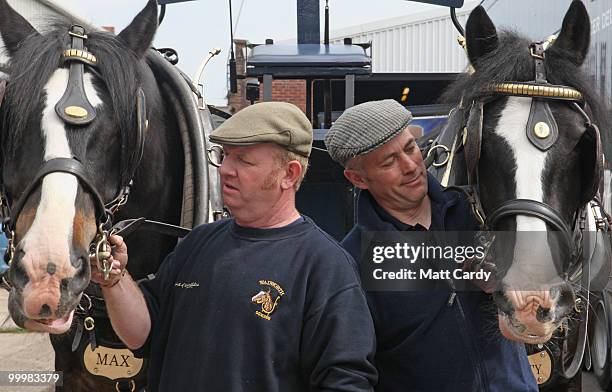 Head horseman Barry Petherick and horseman Martin Whittle arrive back at the brewery stables after they have delivered beer to local pubs using Shire...