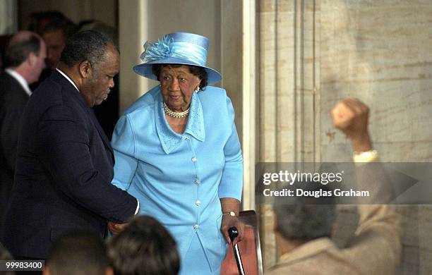 Dorothy Height is helped into her seat during the Gold Medal Ceremony in the U.S. Capitol Rotunda.