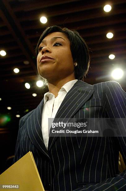 Dominique Dawes walks into the Hart Senate Office Building to testify at the Senate Commerce Committee. The hearing comes at a time when the...