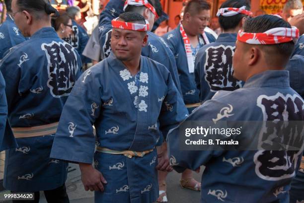 mikoshi portable shrine team at sanja festival in the old downtown asakusa district of tokyo, japan - sanja festival stock pictures, royalty-free photos & images