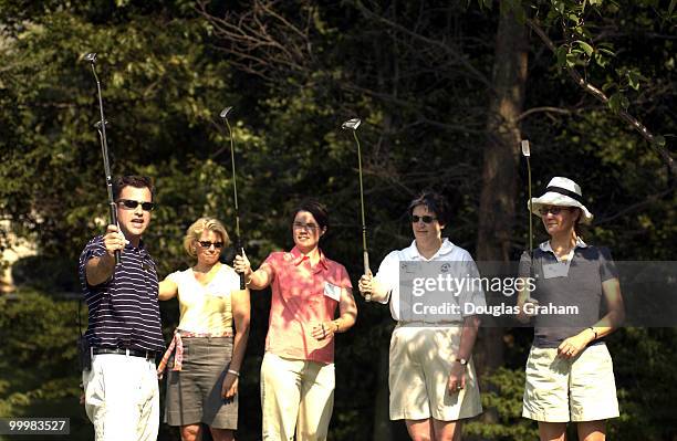 Ben Zatz the asst. Golf pro helps lobbyist Mary Kenkel, Hena Shaw, Janet Sena and Julia Weller during the Women's Networking Forum' was learning how...