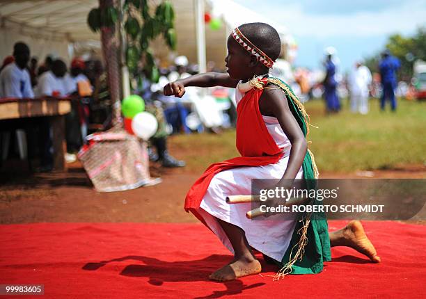 Burundi-vote-Nkurunziza,INTERVIEW" --- Jonathan Nkurunziza, the son of Burundian President Pierre Nkurunziza, performs a dance in front of his father...