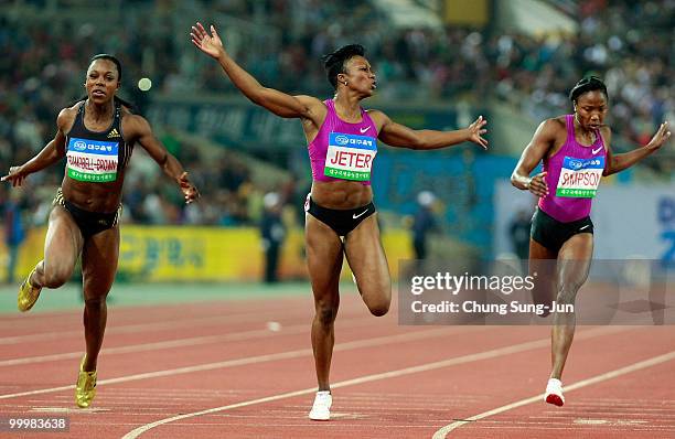 Carmelita Jeter of US heads for the finish line of the women's 100 meters during the Colorful Daegu Pre-Championships Meeting 2010 at Daegu Stadium...