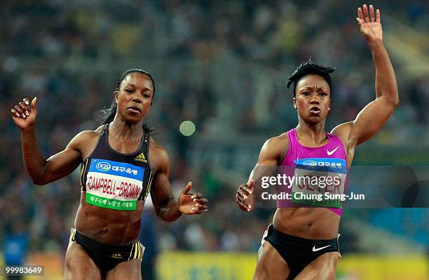 Carmelita Jeter of US and Veronica Campbell-Brown of Jamaica compete in the women's 100 meters during the Colorful Daegu Pre-Championships Meeting...