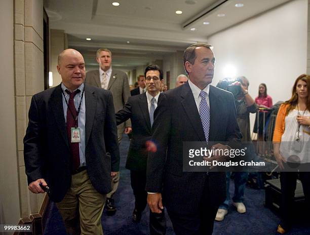 House Republican Leader John Boehner, R-OH. And House Republican Whip Eric Cantor, R-VA., leave the House Republican Conference in the CVC basement...