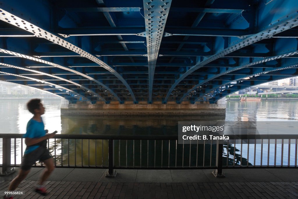 Riverside Promenade and Komagata Bridge on Sumida River in the Old Asakusa District of Tokyo, Japan