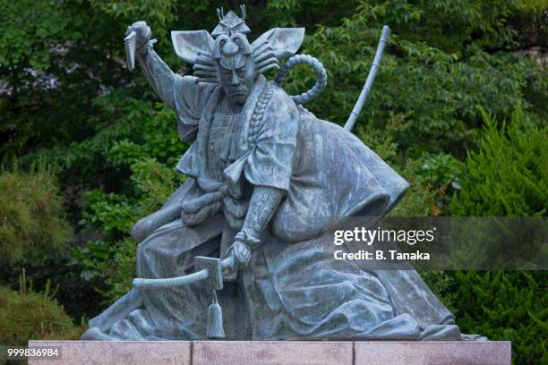 bronze statue of kabuki actor at senso-ji temple in the old downtown asakusa district of tokyo, japan - taito ward stock pictures, royalty-free photos & images