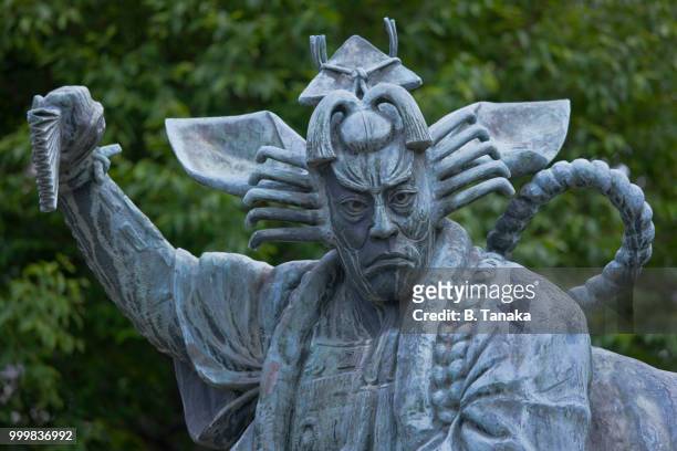bronze statue of kabuki actor at senso-ji temple in the old downtown asakusa district of tokyo, japan - taito ward stock pictures, royalty-free photos & images