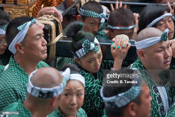 mikoshi portable shrine team at sanja festival in the old downtown asakusa district of tokyo, japan - tanaka stock pictures, royalty-free photos & images