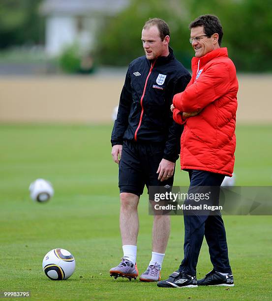 Wayne Rooney speaks to Fabio Capello during an England training session on May 19, 2010 in Irdning, Austria.